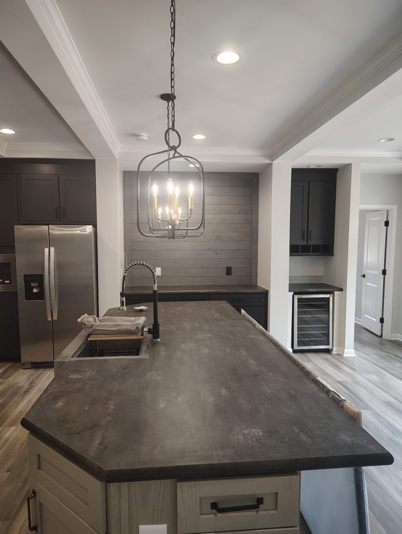 Pendant and recessed LED lighting installed in a kitchen