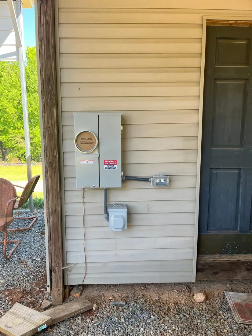 New 200-amp meter main service with emergency disconnect installed outdoors
