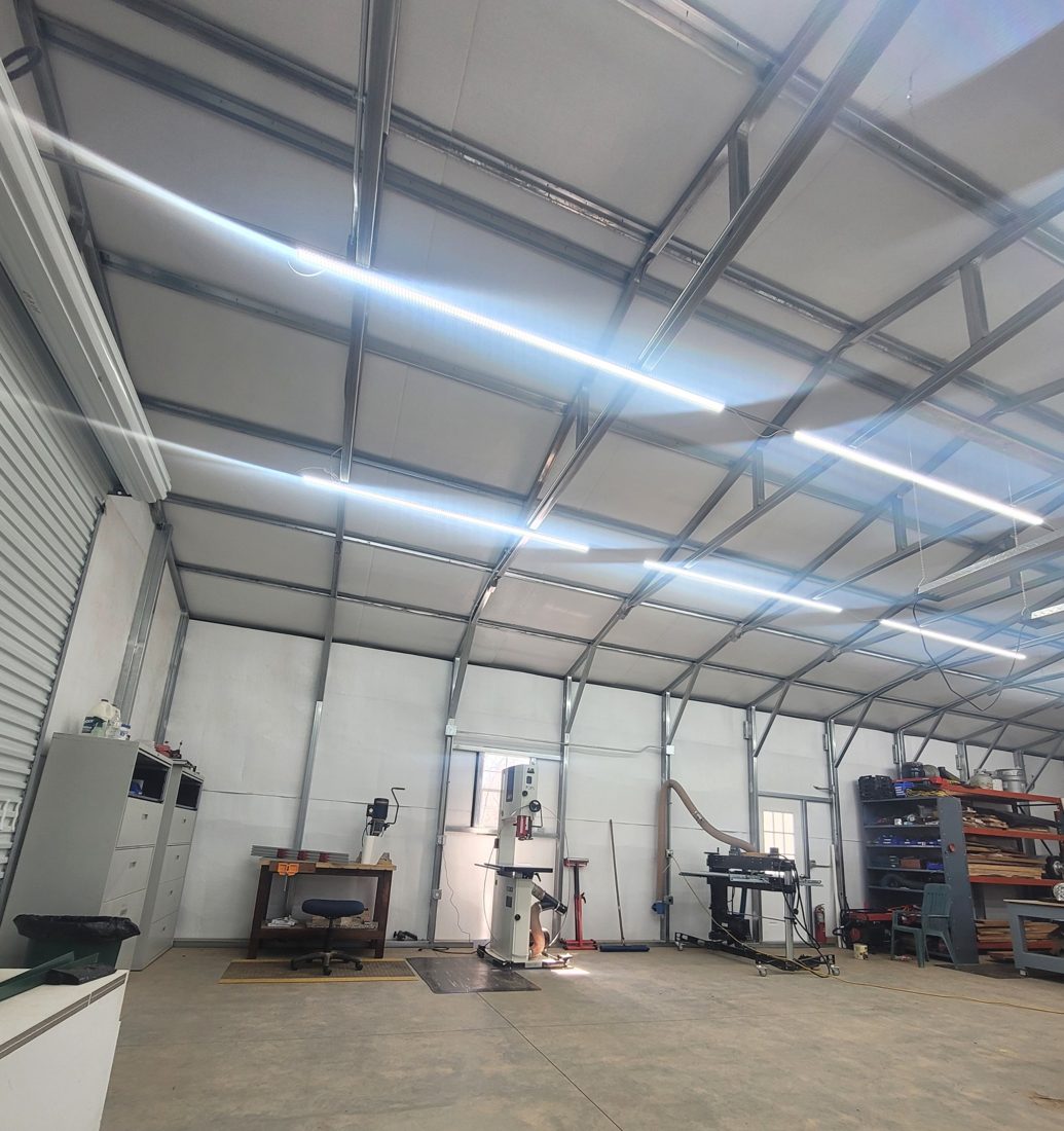 Bright LED lighting installed in a workshop space
