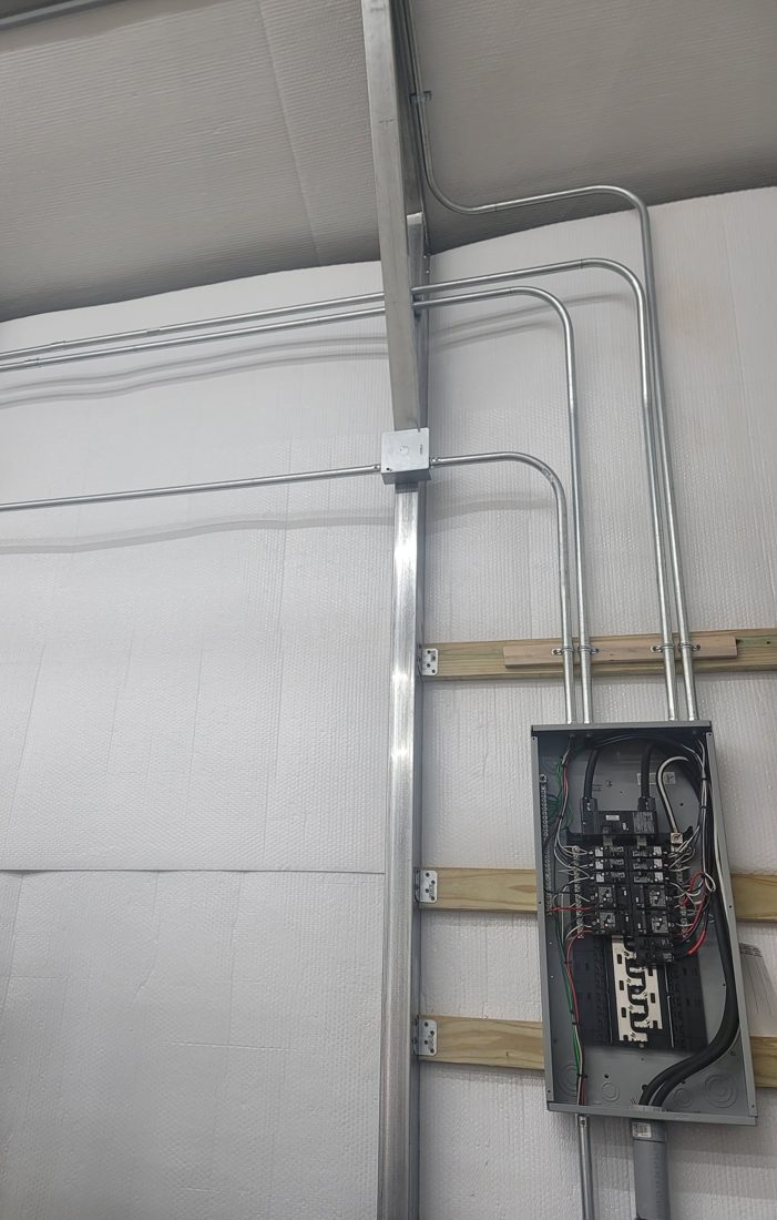 Panel and conduit work installed in a workshop